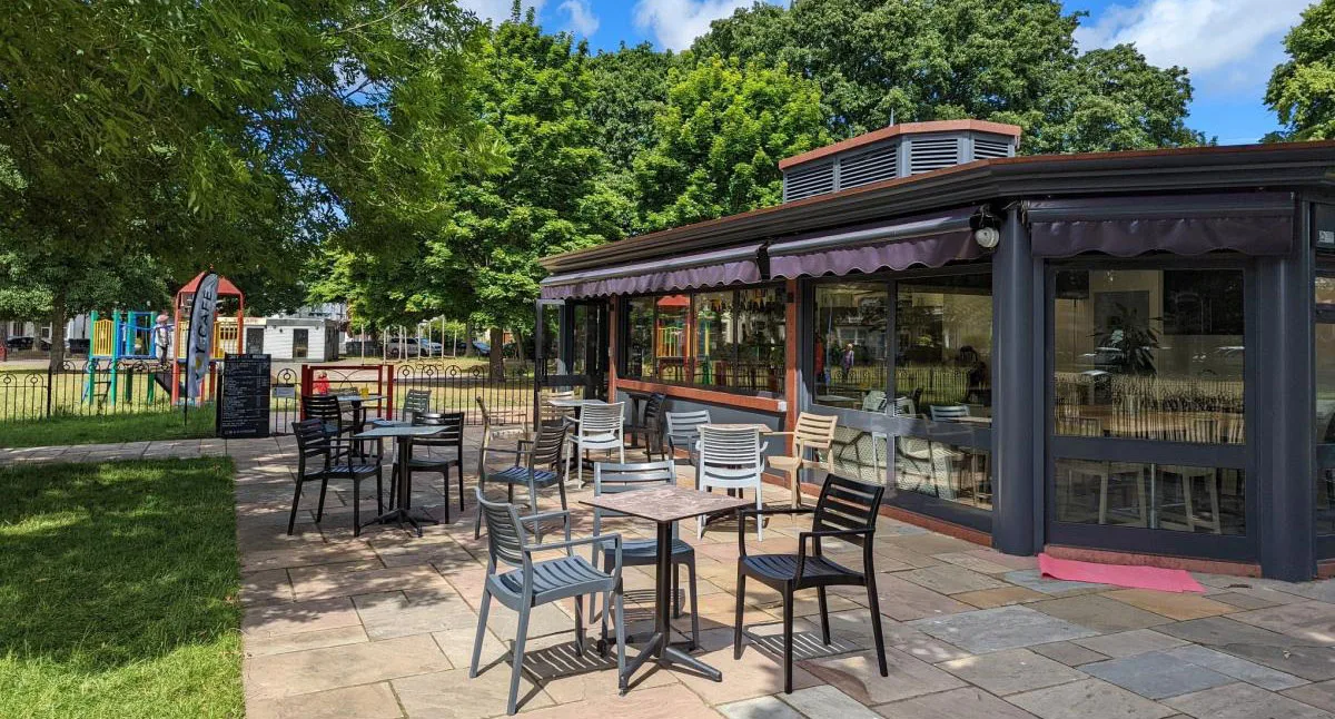 The community café in Churchill Gardens, Boscombe, with the play area behind it